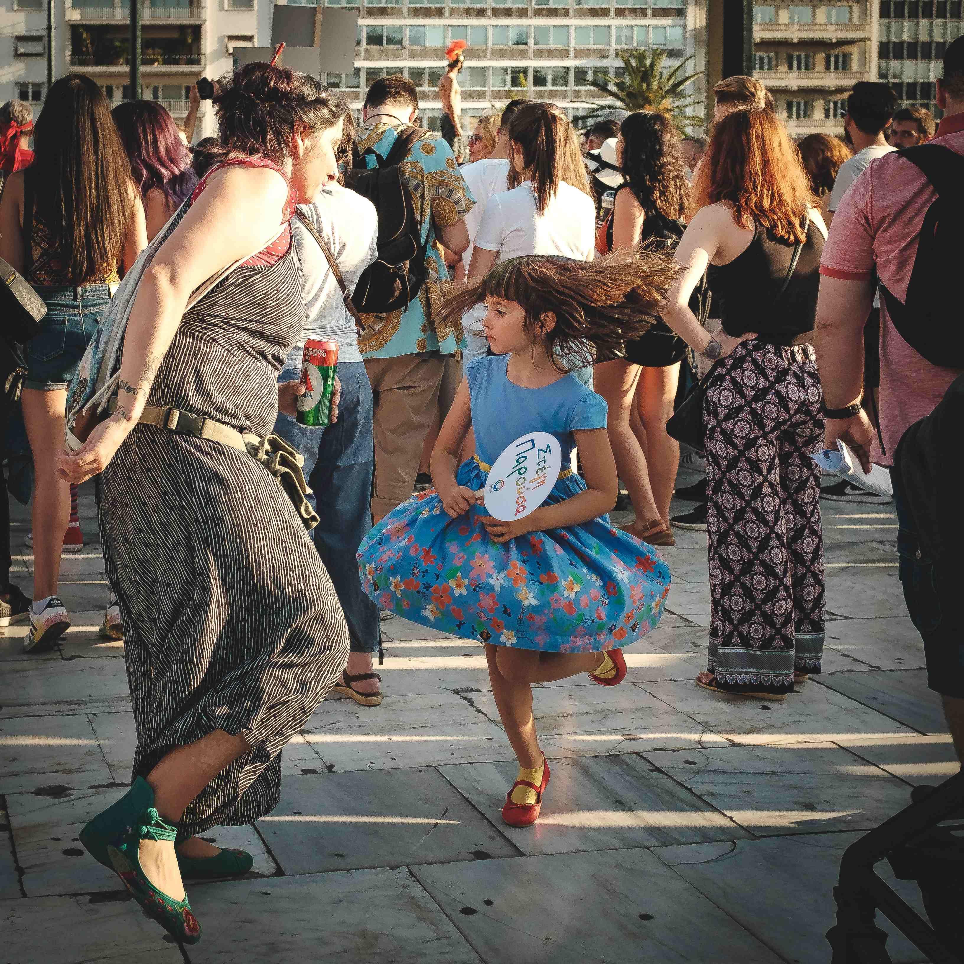 Two people dancing on the streets